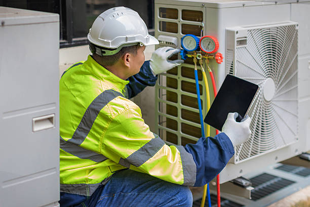 Professional Hvac technician working in Slinger, WI